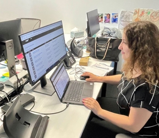 Crystelle at desk